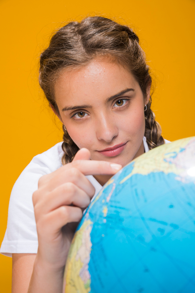 portrait-schoolgirl-with-globe